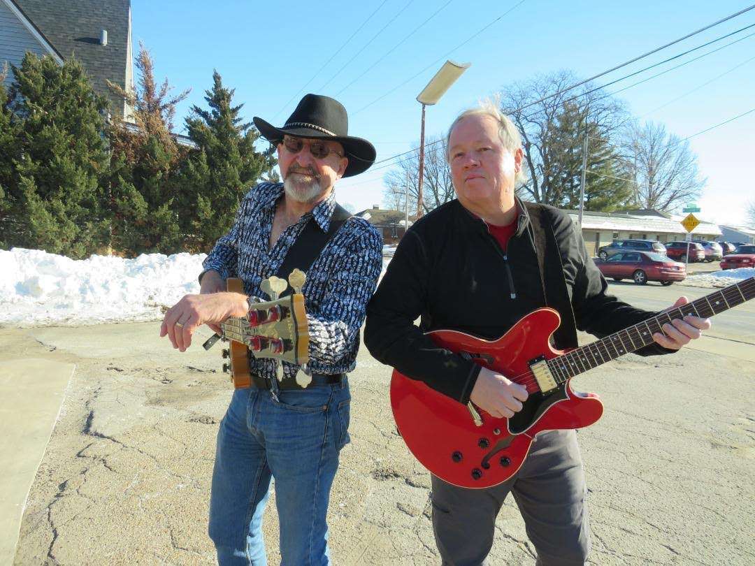 Paul Miller, left, and Tom Nelson, right, still play together in the bands Leaving Abbey and Fretworks. Photo by William Smith.